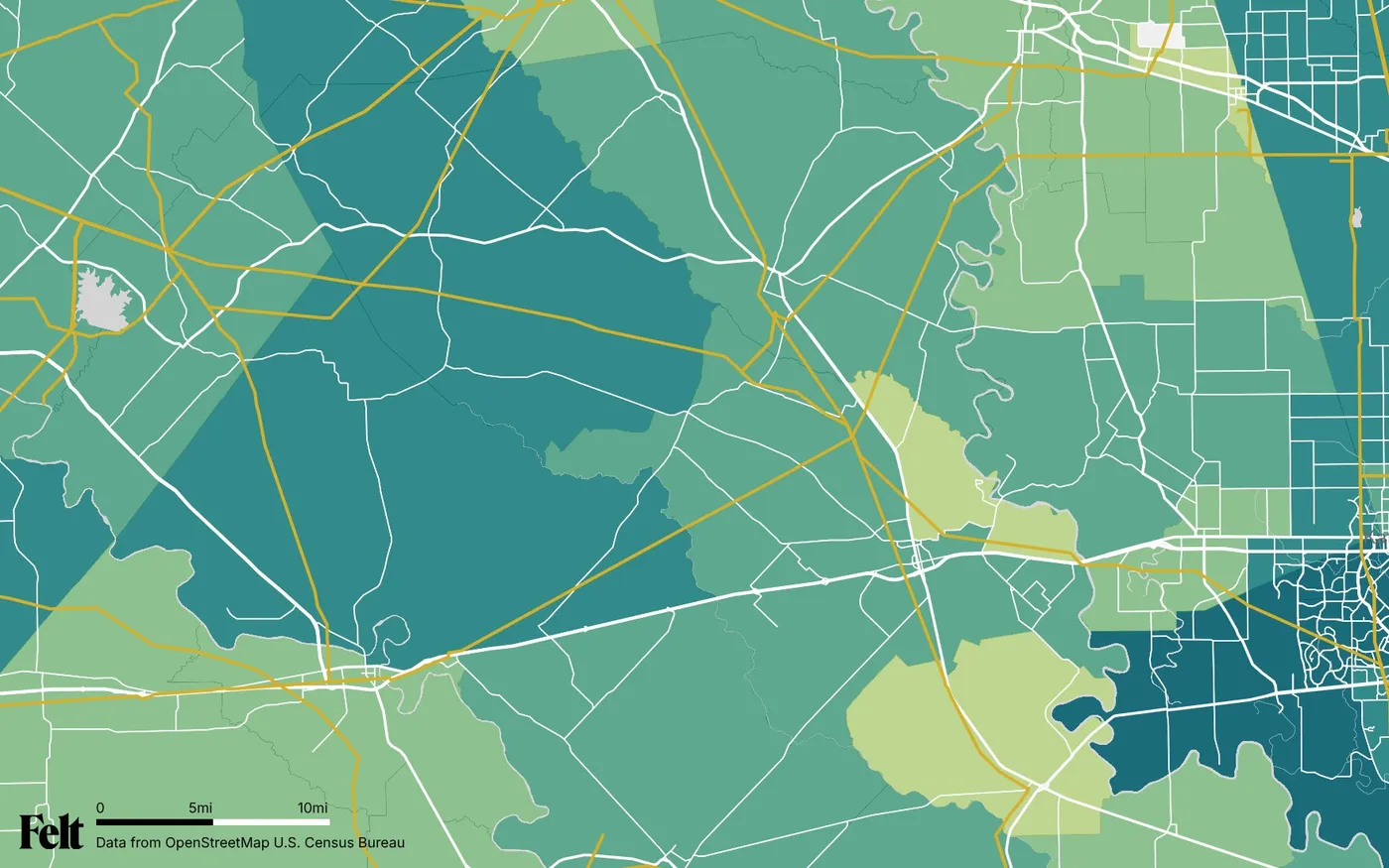 Map of Austin County, Texas: the county outlined, with transmission lines over median household income by census tract