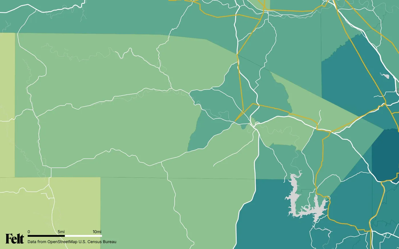 Map of Bandera County, Texas: the county outlined, with transmission lines over median household income by census tract