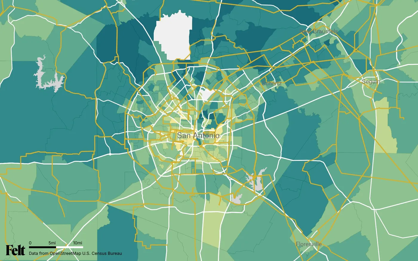 Map of Bexar County, Texas: the county outlined, with transmission lines over median household income by census tract