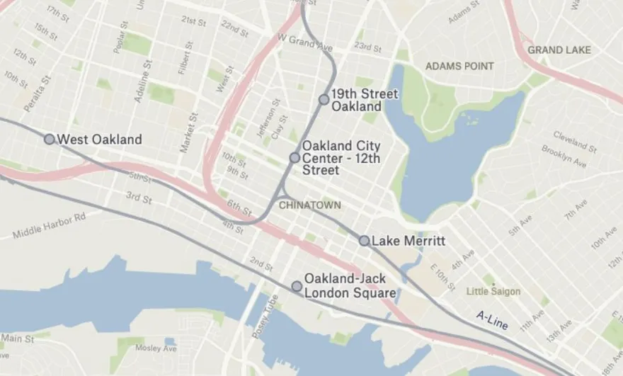 A raster map of downtown Oakland with BART stations, where labels and line edges look soft and pixelated