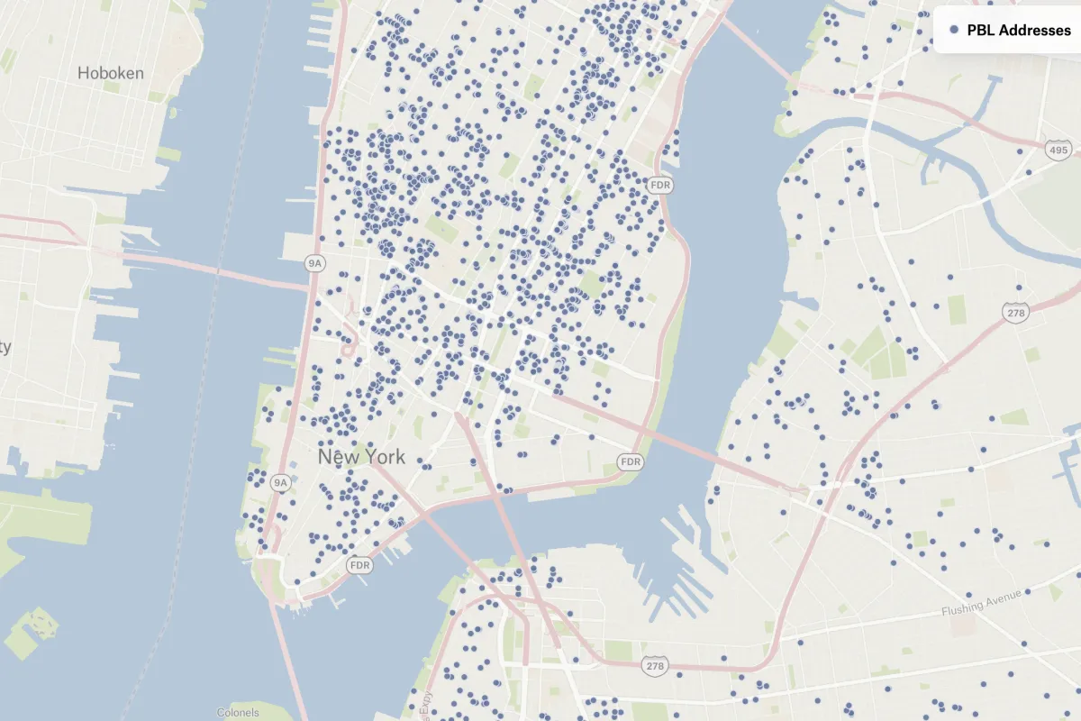 A Felt map of Manhattan, Brooklyn and Queens with dots marking addresses where Airbnb rentals are banned