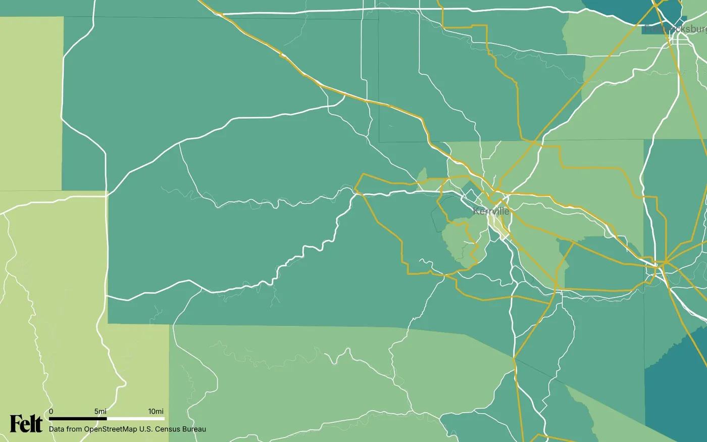 Map of Kerr County, Texas: the county outlined, with transmission lines over median household income by census tract