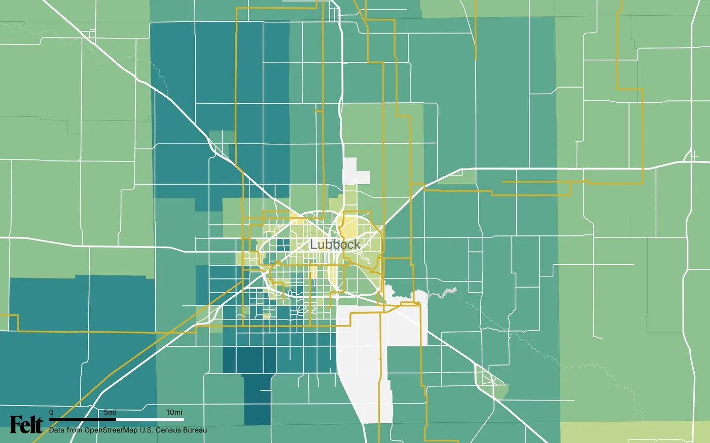 Map of Lubbock County, Texas: the county outlined, with transmission lines over median household income by census tract