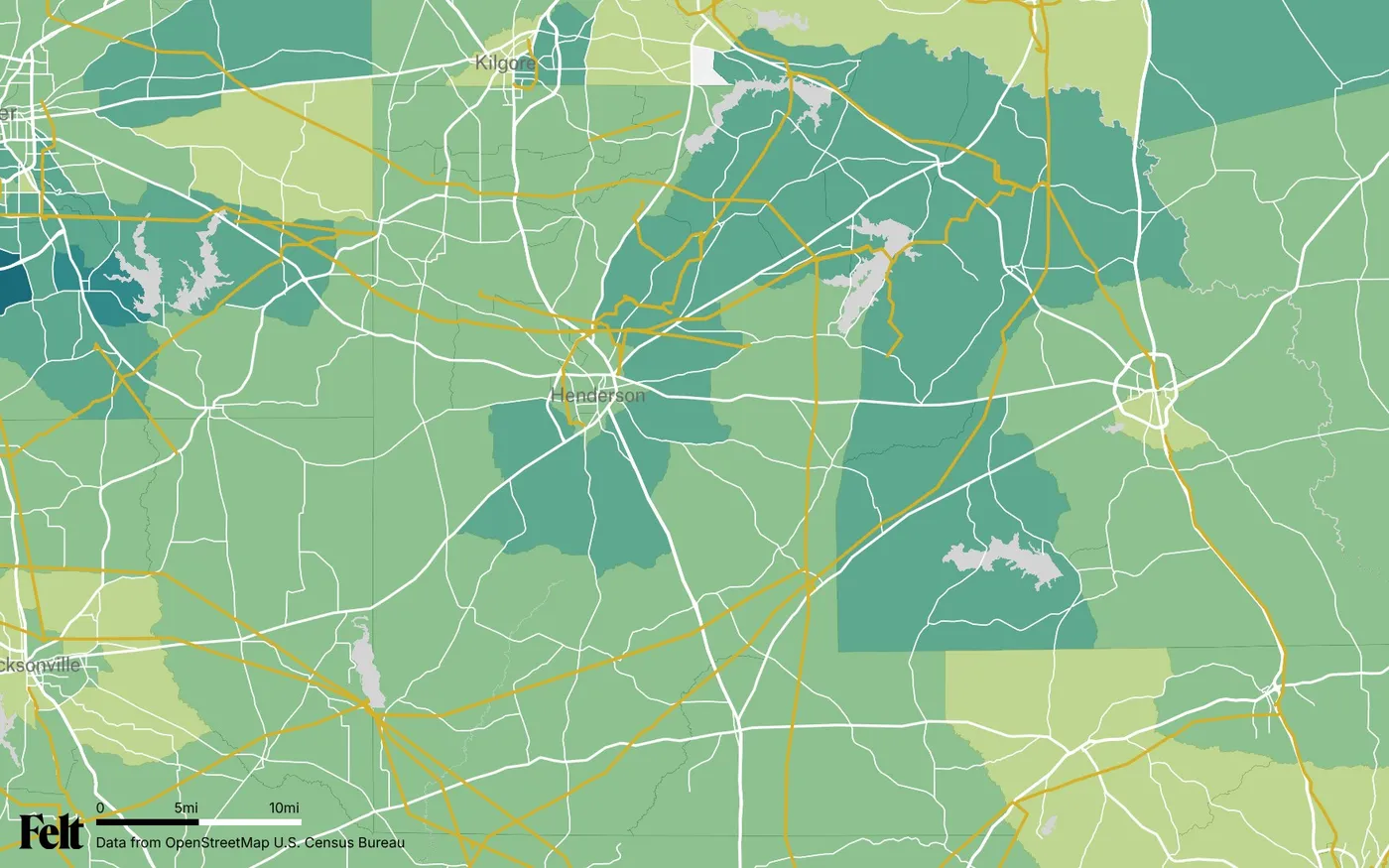 Map of Rusk County, Texas: the county outlined, with transmission lines over median household income by census tract
