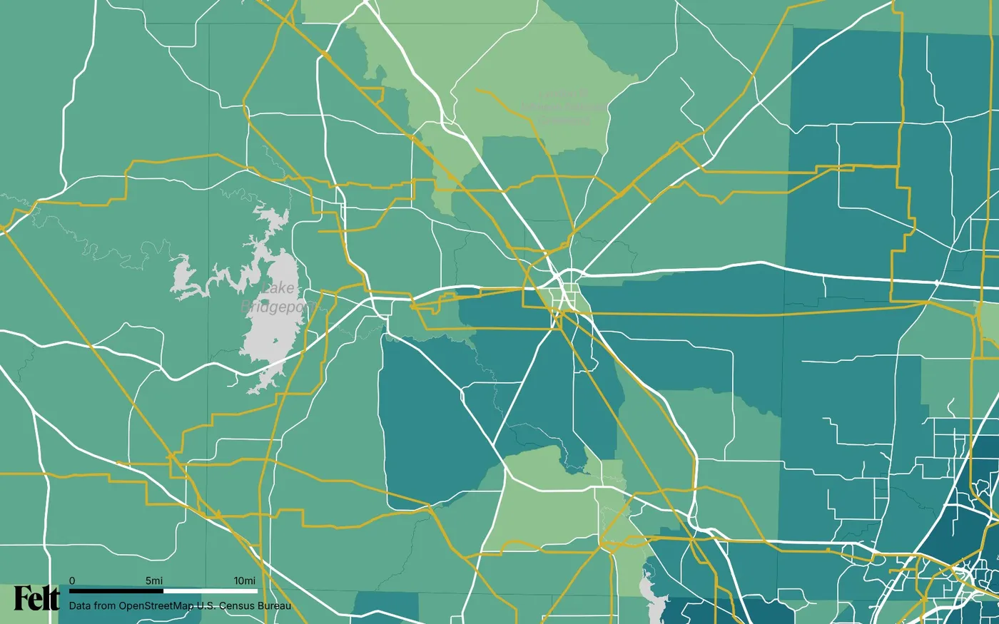 Map of Wise County, Texas: the county outlined, with transmission lines over median household income by census tract